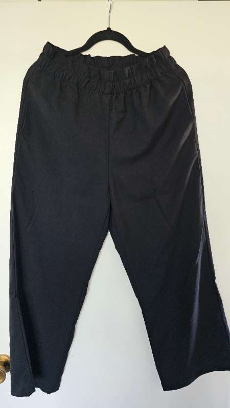 Svartar víðar buxur - H&M