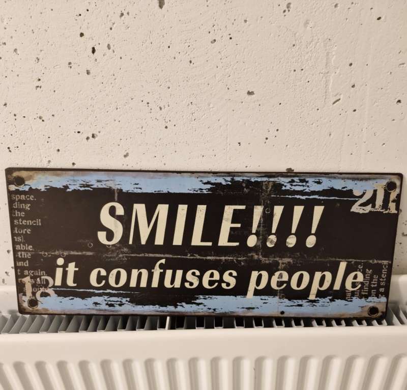 Skilti Smile