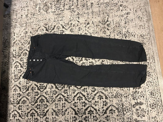Svartar gallabuxur Levis