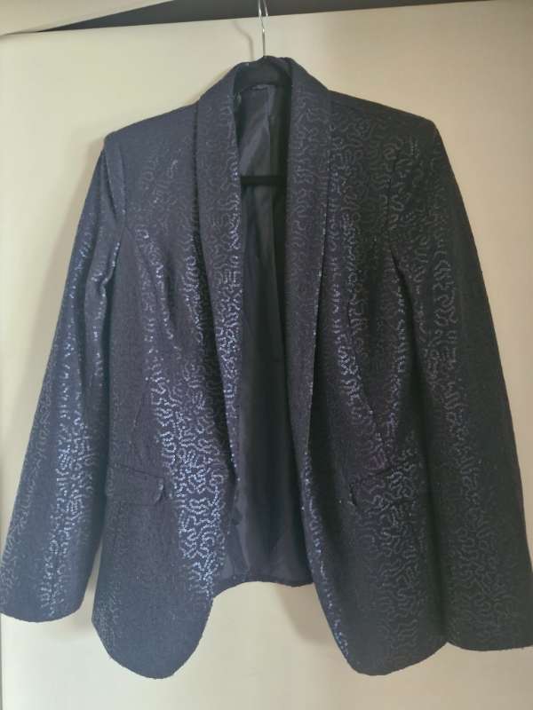 Oasis pallíettujakki