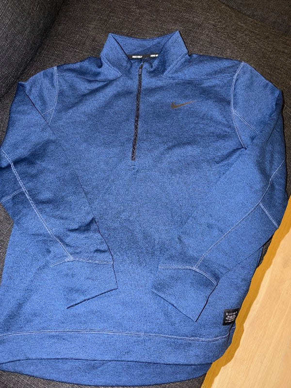 Nike golfpeysa rennd blá