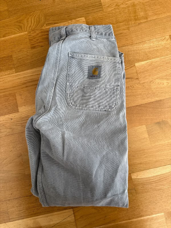 Gráar Carhartt buxur