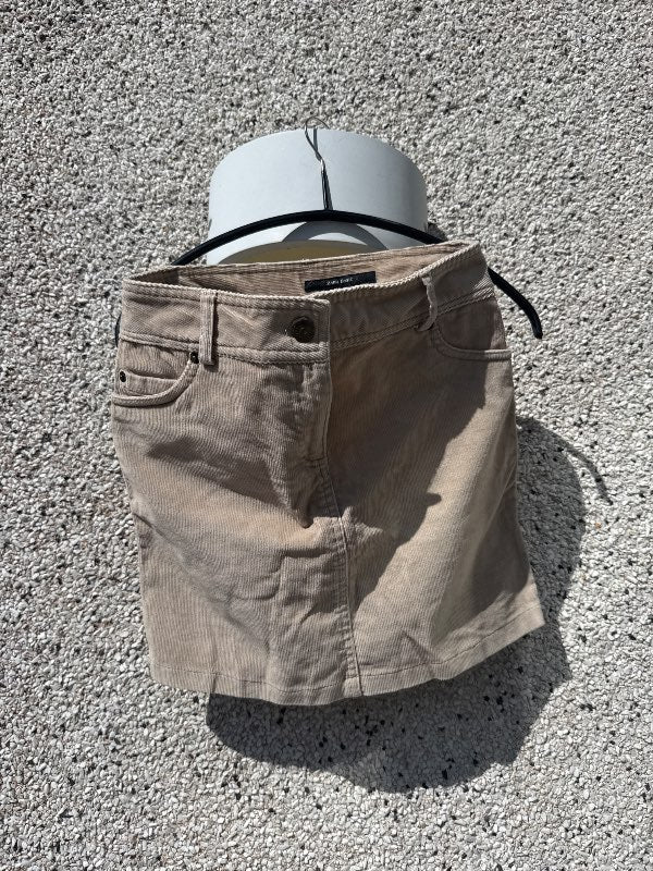 Beige pils Zara