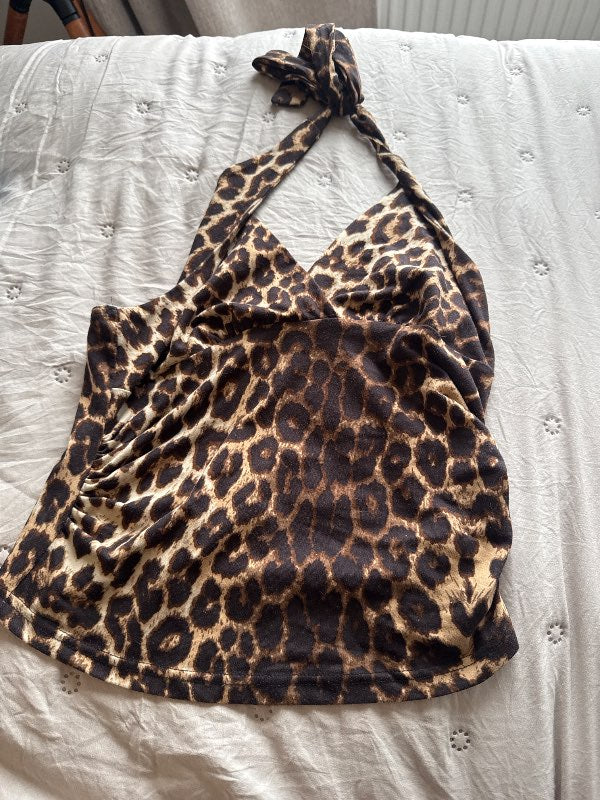 Backless cheetah bolur